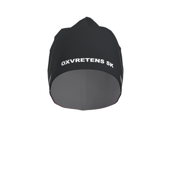 Bi-Elastic Cap