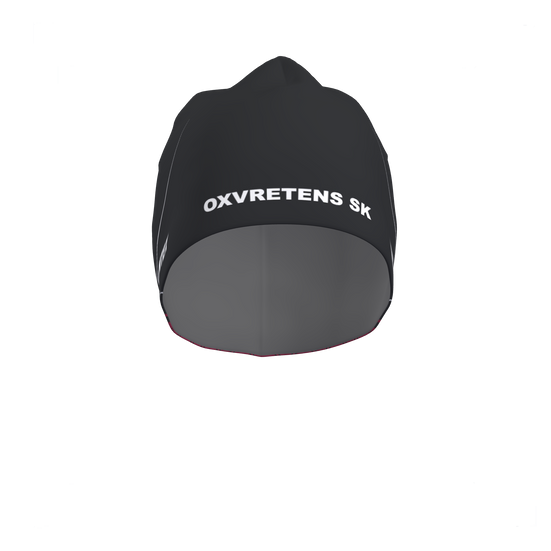 Bi-Elastic Cap